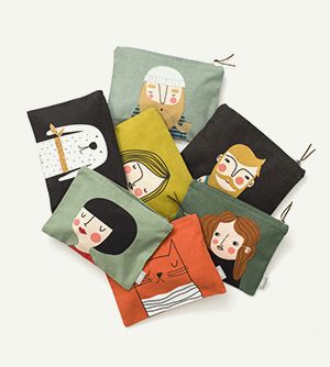 Illustrierte Gesichter auf bunten Toilettentaschen aus 100% Baumwolle.